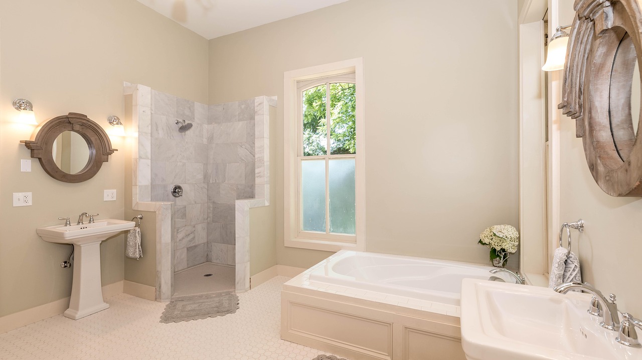 Bathtub with a large-tile surround and recessed shelf